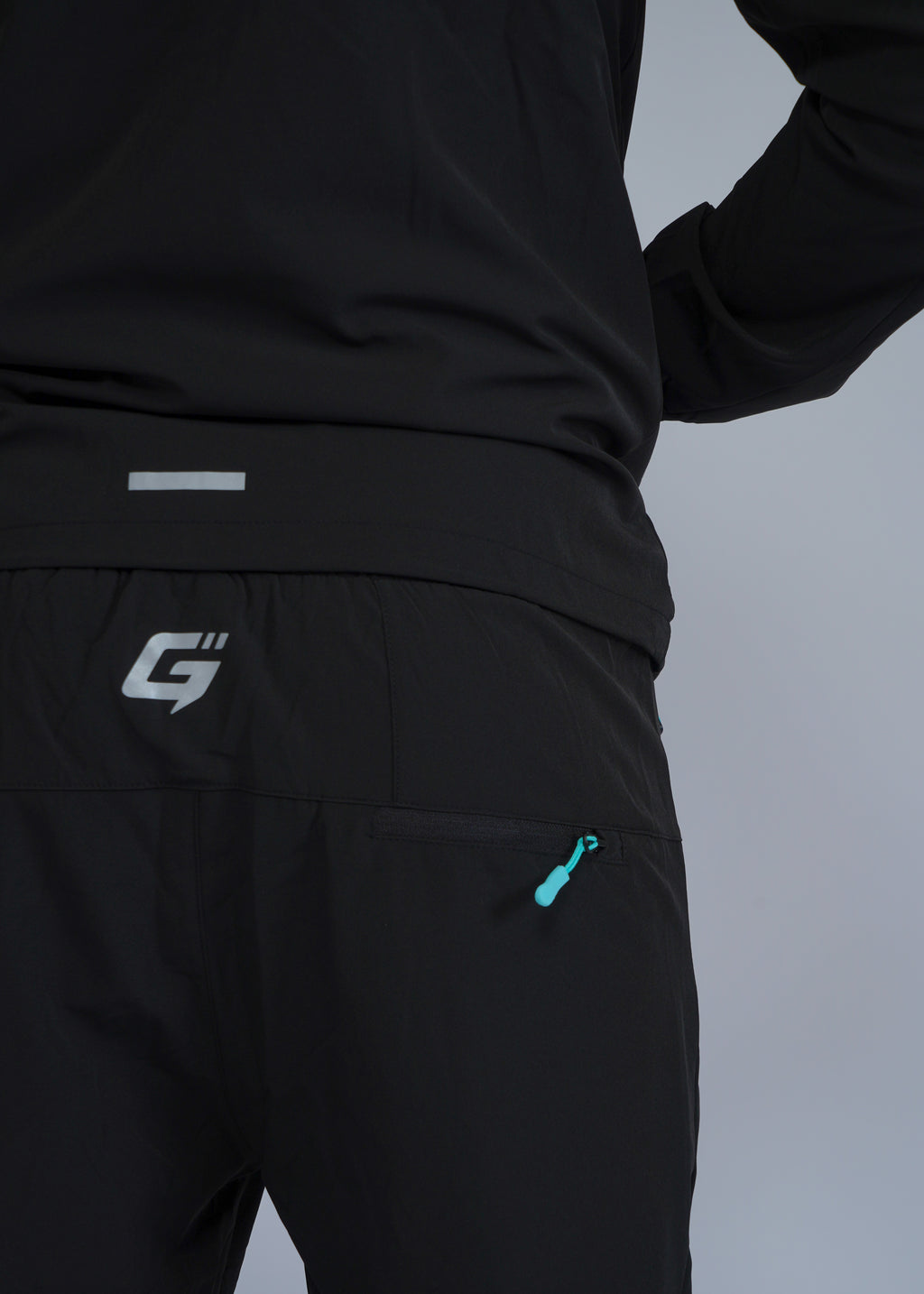 REFLECT 1.0 TRACKSUIT - BLACK/AQUA