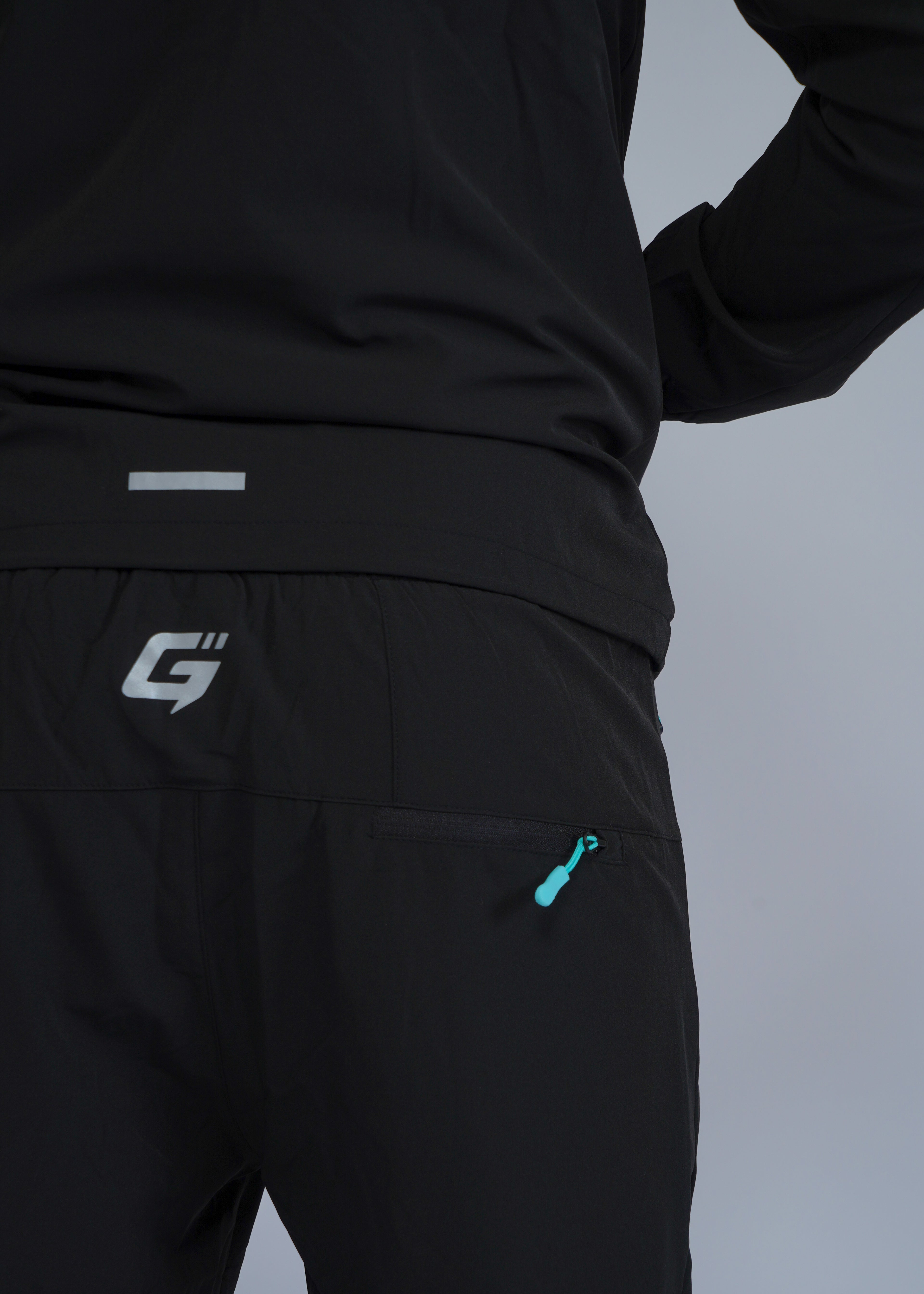 REFLECT 1.0 TRACKSUIT - BLACK/AQUA