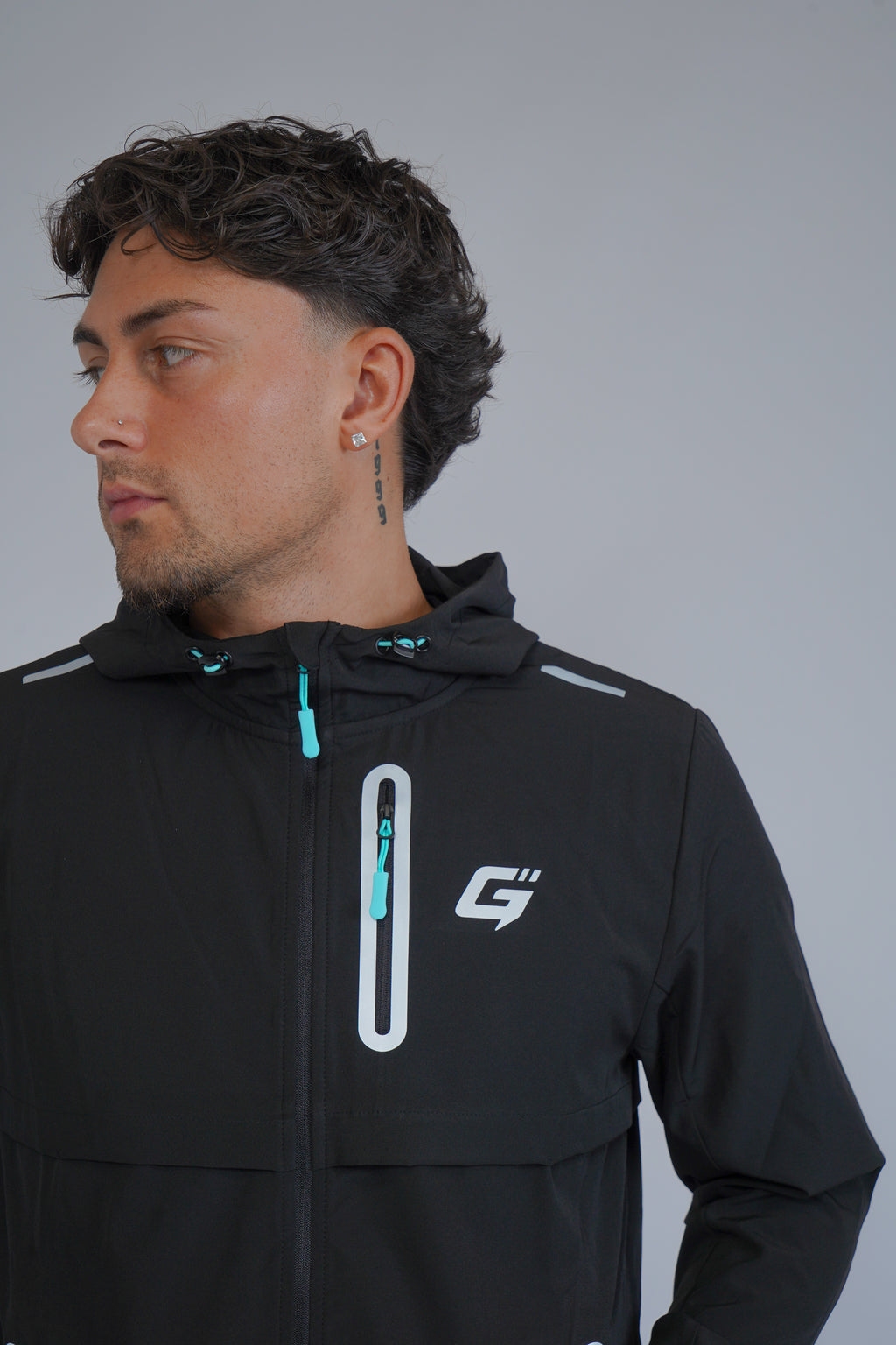 REFLECT 1.0 TRACKSUIT - BLACK/AQUA