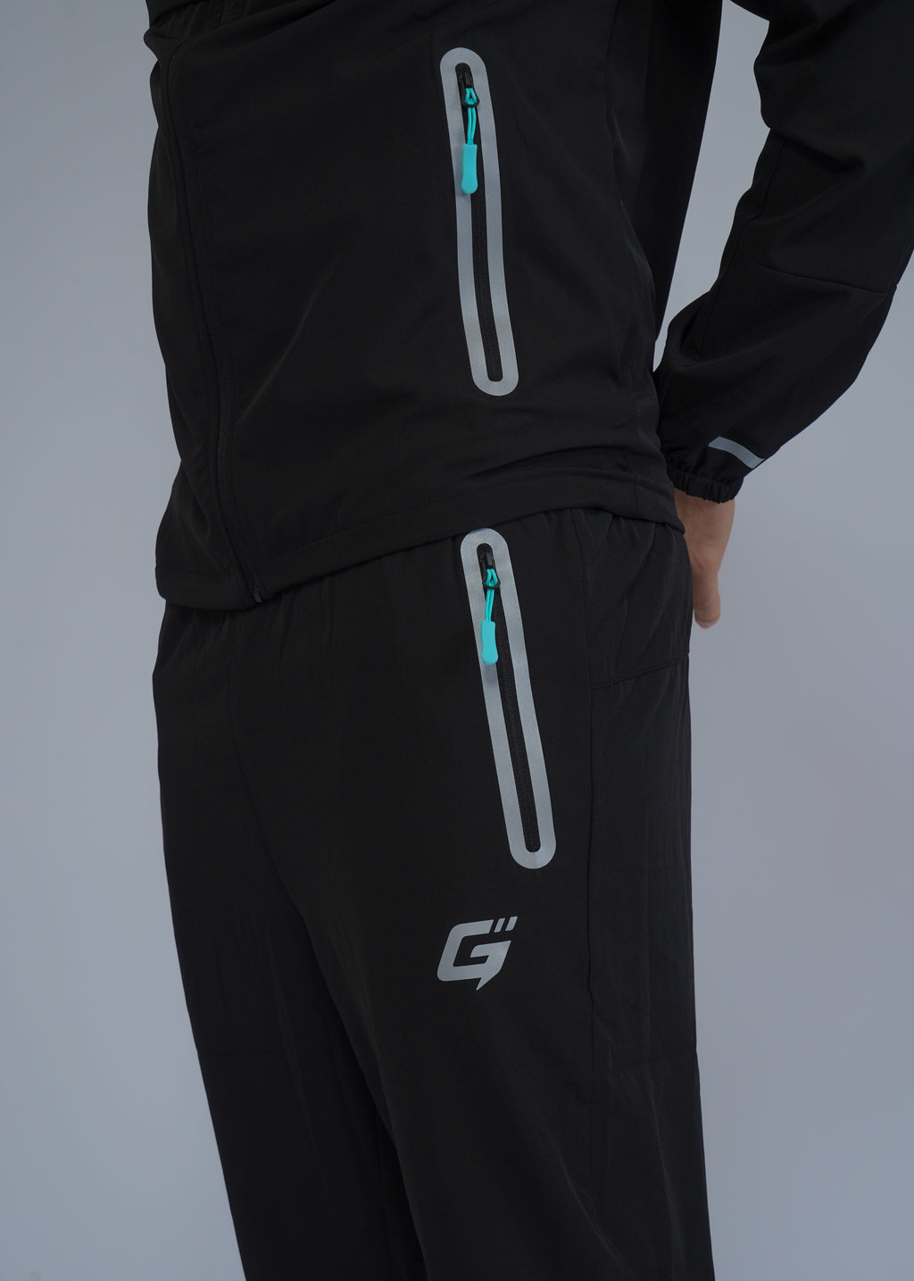 REFLECT 1.0 TRACKSUIT - BLACK/AQUA