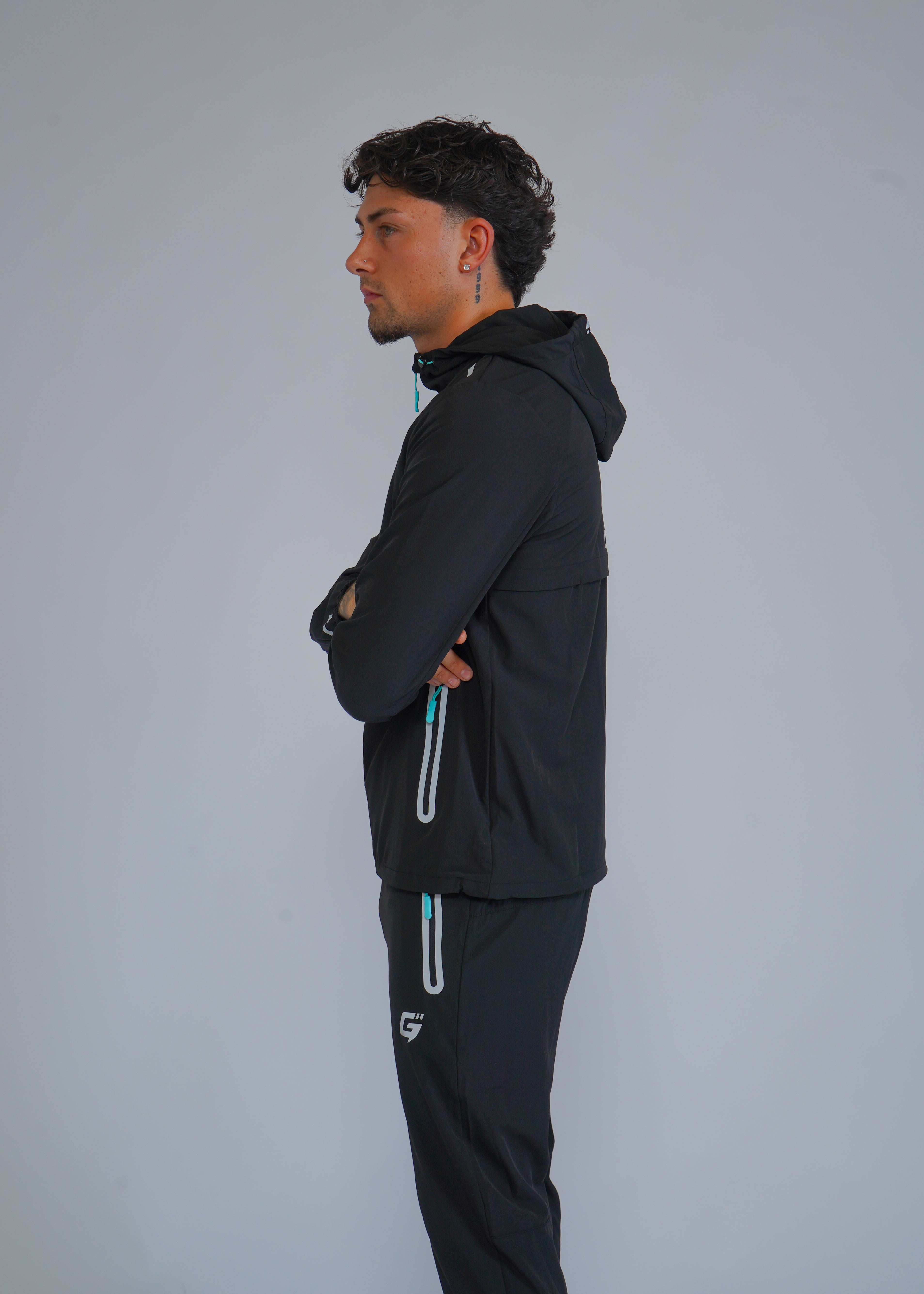 REFLECT 1.0 TRACKSUIT - BLACK/AQUA